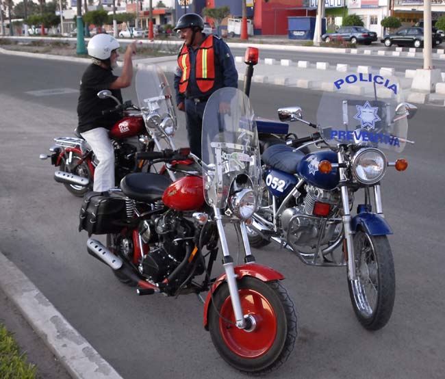 Simon and Jose, the Cuidad Constitucion motor officer, on our way to dinner