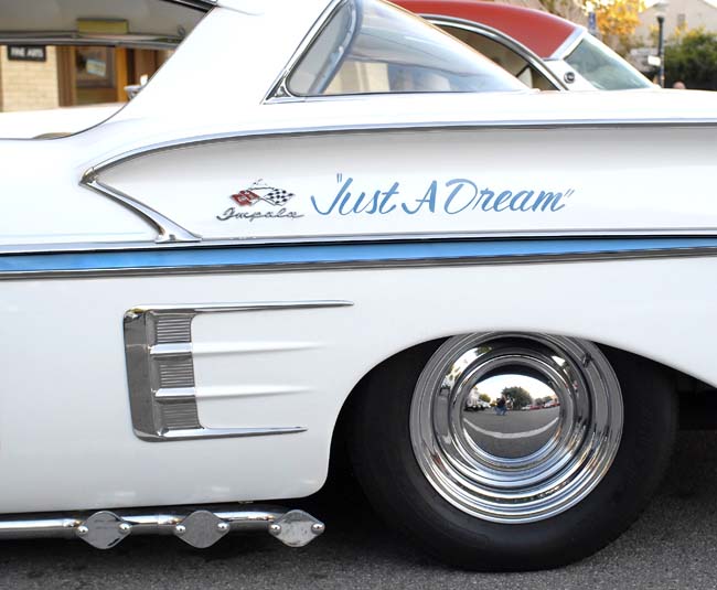 A '58 Chevy coupe with lake pipes