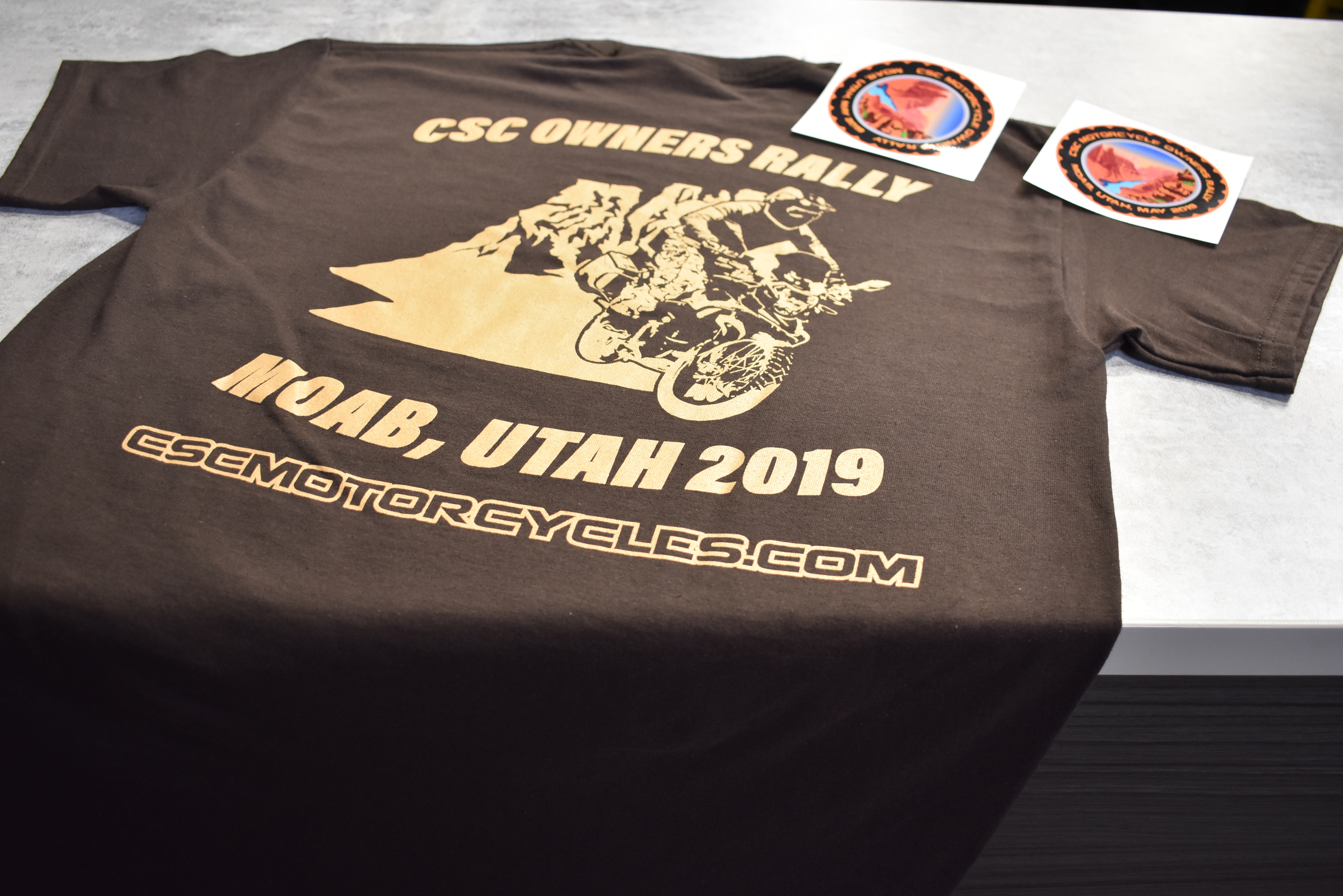 CSC Motorcycles Owner's Rally! Moab, Utah 2019 May 22, 23, & 24 Event T-Shirt in Brown.